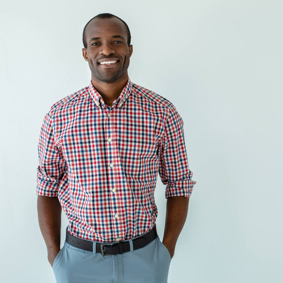 Man smiles looking at camera